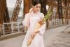 Hoa hậu Đỗ H&agrave; diện &aacute;o d&agrave;i dạo phố xu&acirc;n H&agrave; Th&agrave;nh  trước thềm Tết nguy&ecirc;n đ&aacute;n