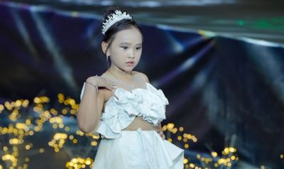 Model Kid Thiên Kim làm vedette cho NTK Vinh Quang